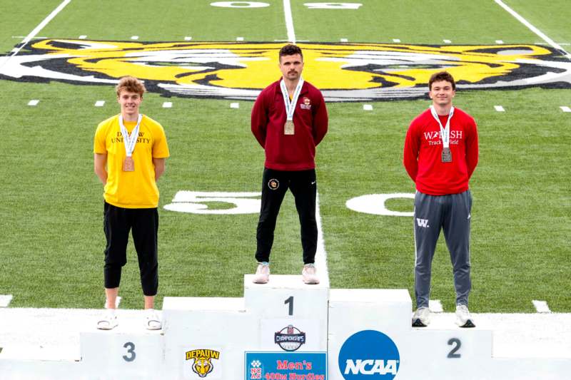 a group of men standing on a podium