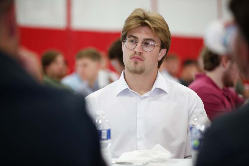 a man in a white shirt