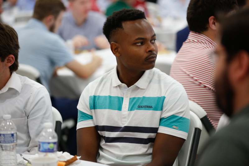 a man sitting at a table