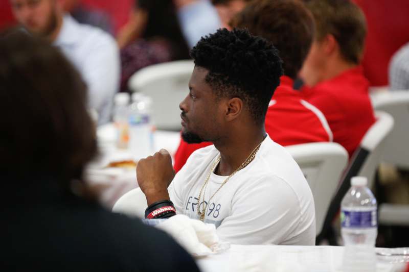 a man sitting at a table