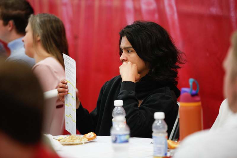 a person holding a piece of paper