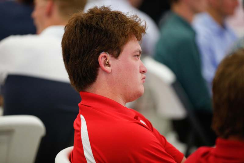 a man in a red shirt