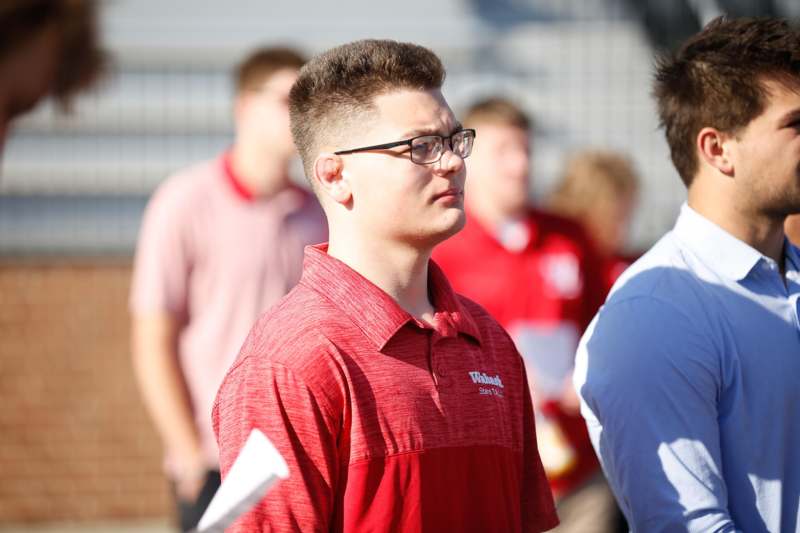 a man in a red shirt