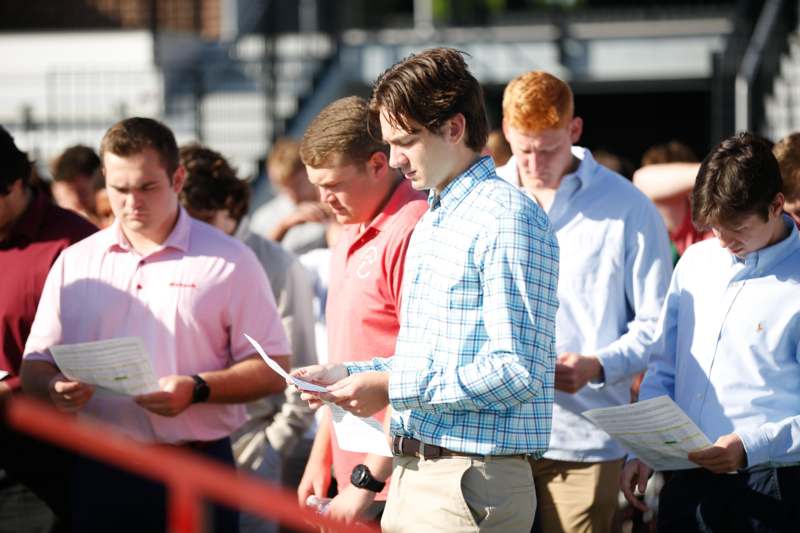 a group of people standing outside