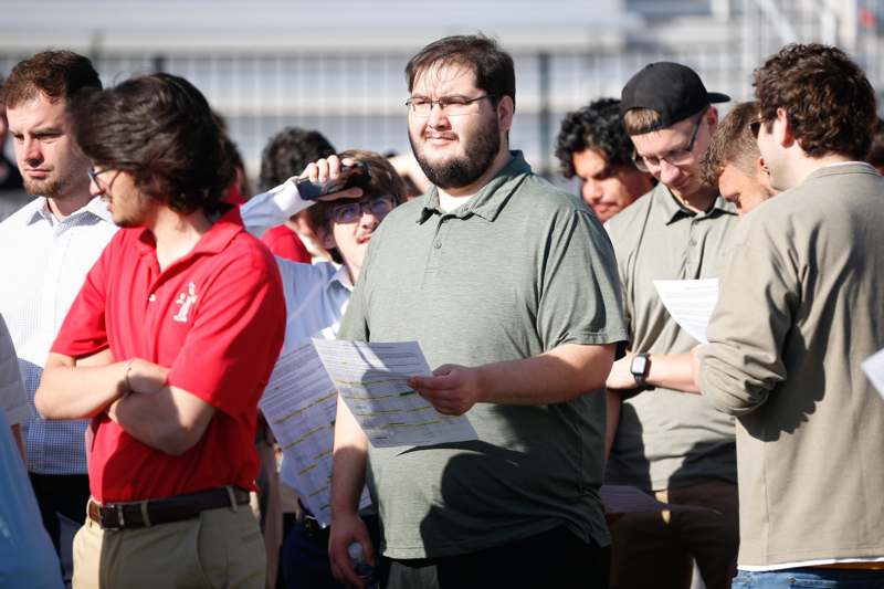 a group of people standing outside