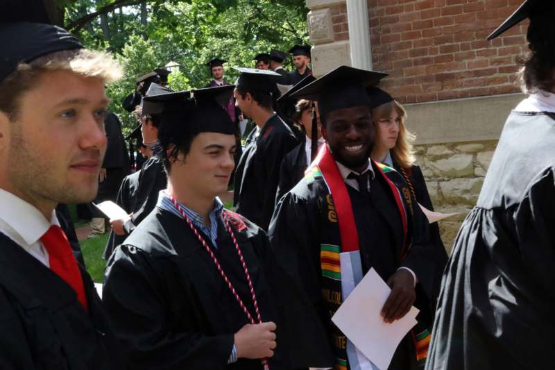 a group of people in graduation gowns