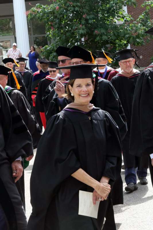 a woman in a graduation gown