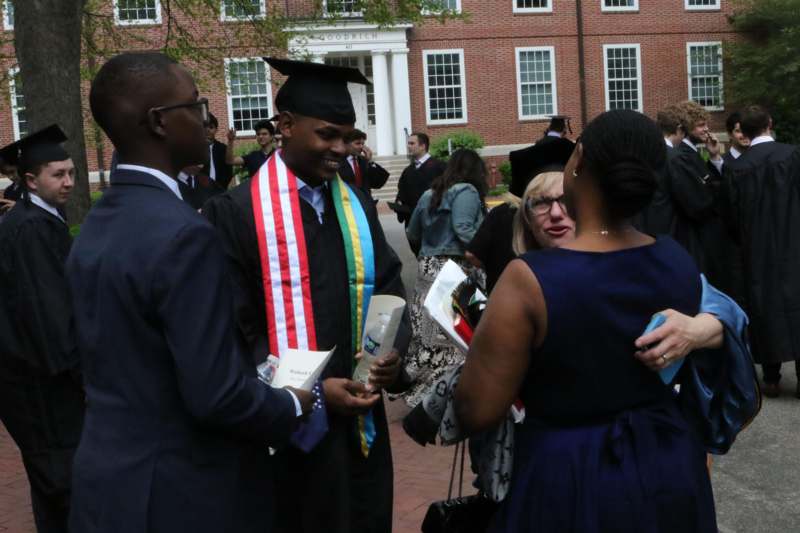 a group of people in graduation gowns