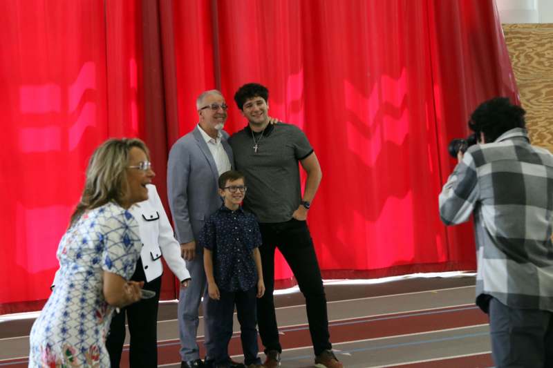 a group of people standing on a stage