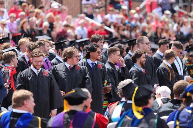 a group of people in graduation gowns