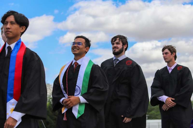 a group of people wearing graduation gowns