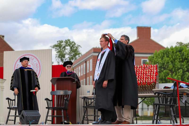 a group of people wearing graduation gowns