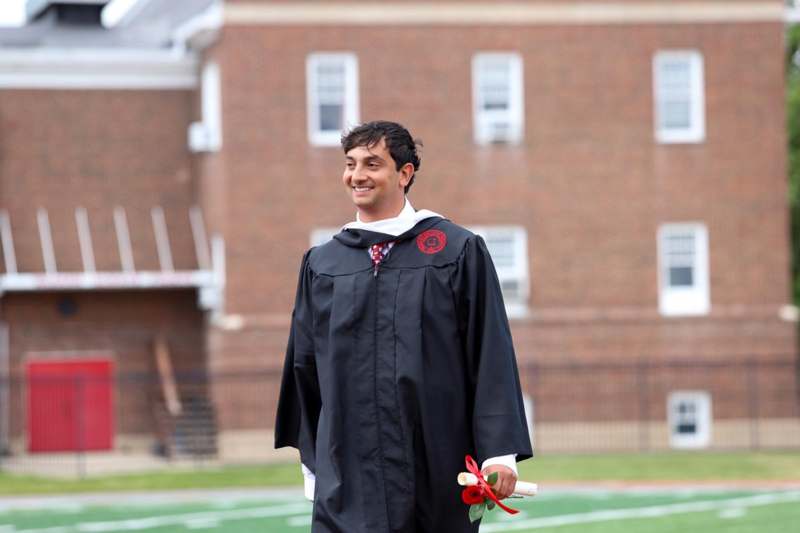 a man in a graduation gown