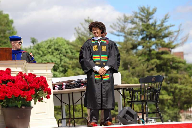 a man in a graduation gown