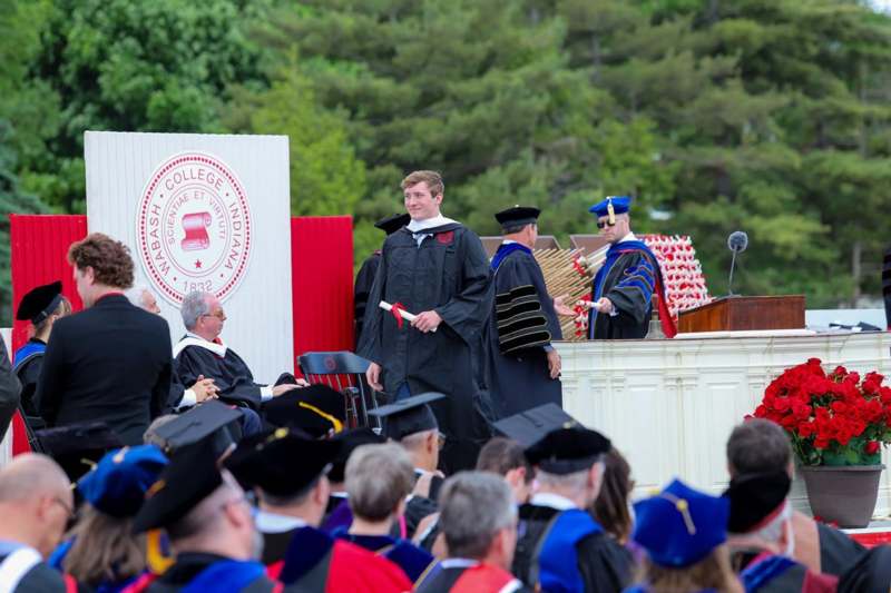 a group of people in graduation gowns