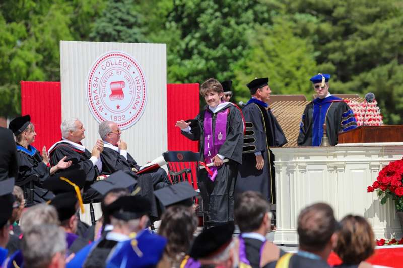 a group of people in graduation gowns