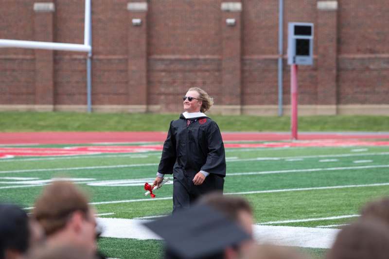 a woman in a graduation gown