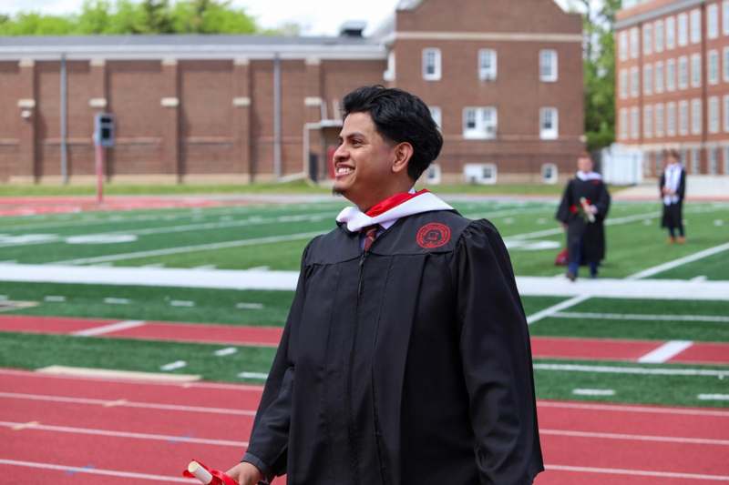 a man in a graduation gown