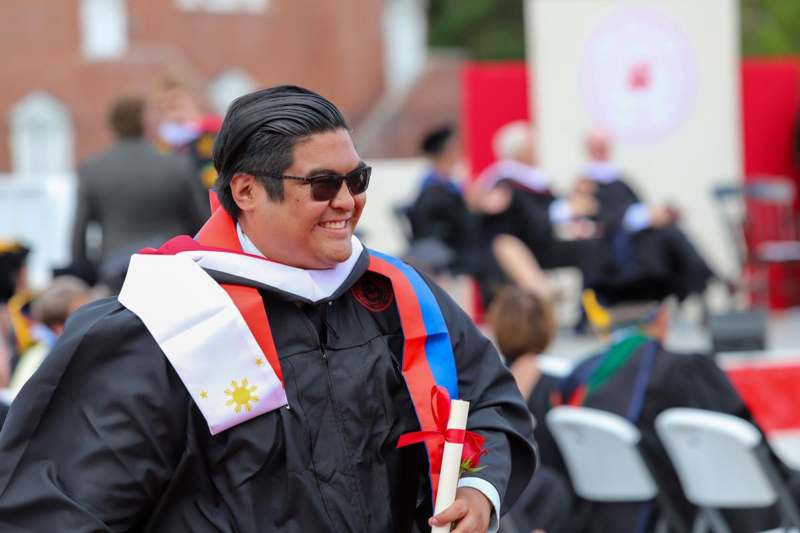 a man in a graduation gown