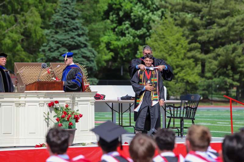 a group of people in graduation gowns