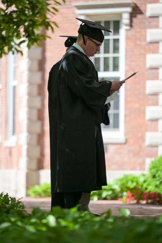 a man in a graduation gown