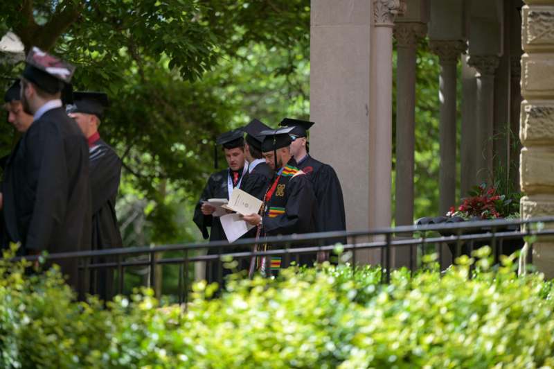 a group of people in graduation gowns