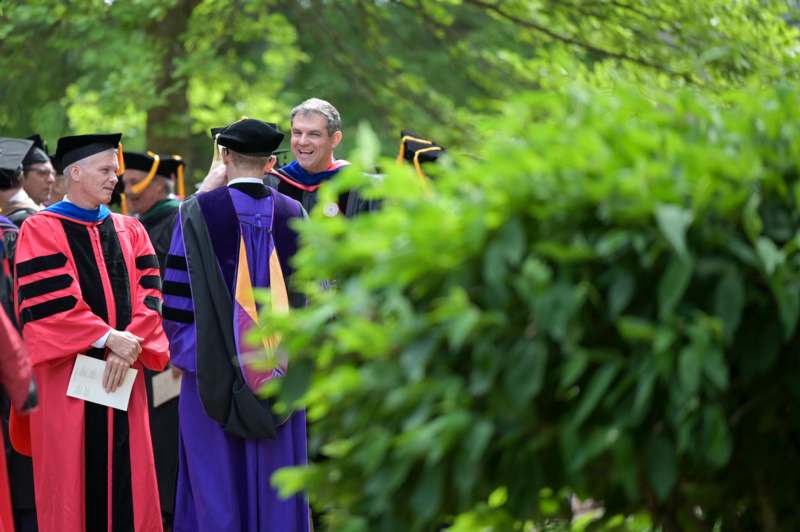 a group of people wearing graduation gowns