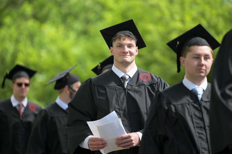 a group of people in graduation gowns