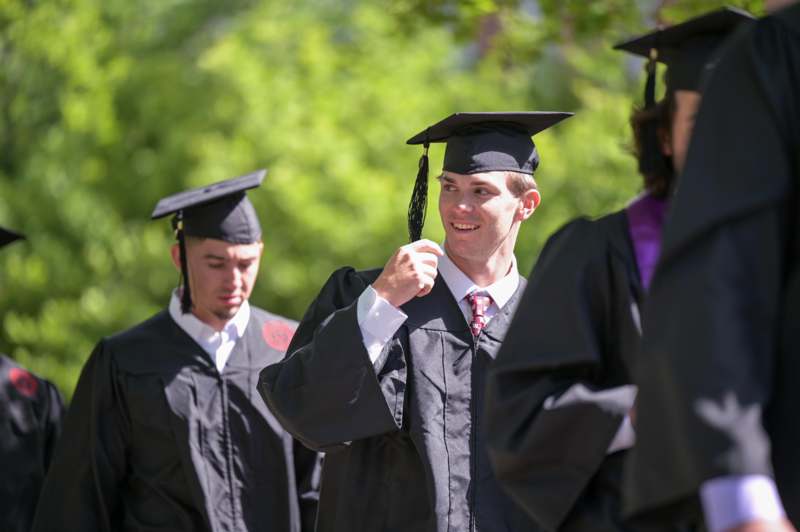 a group of people in graduation gowns