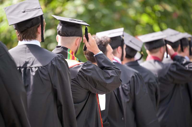 a group of people in graduation gowns