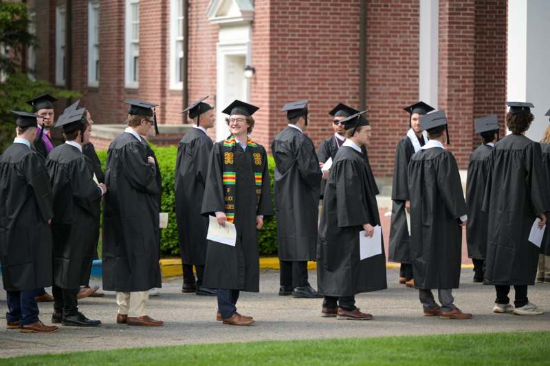 a group of people in graduation gowns