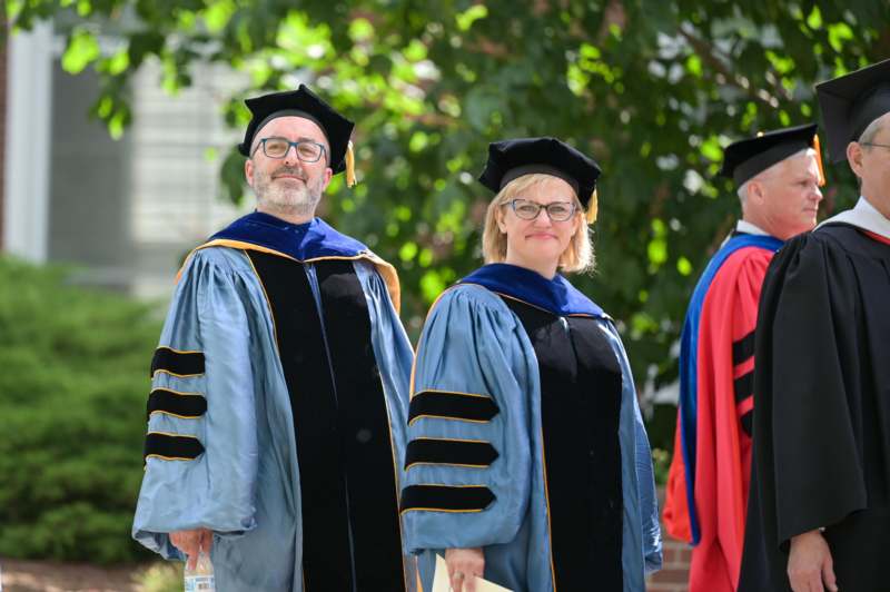 a group of people in graduation gowns