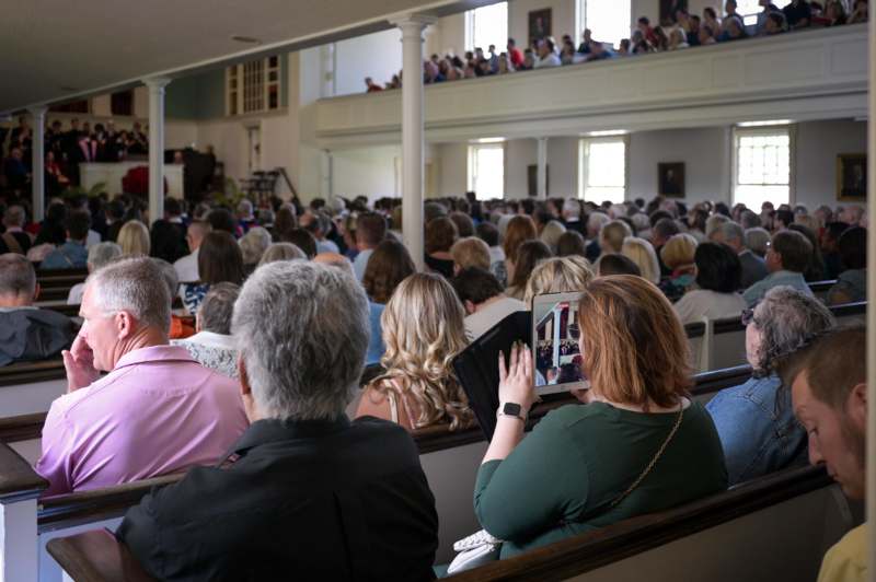 a group of people sitting in a room
