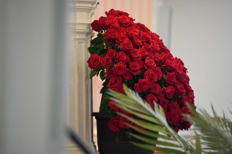 a large bouquet of red roses