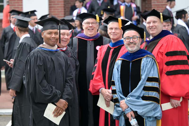 a group of people in graduation gowns