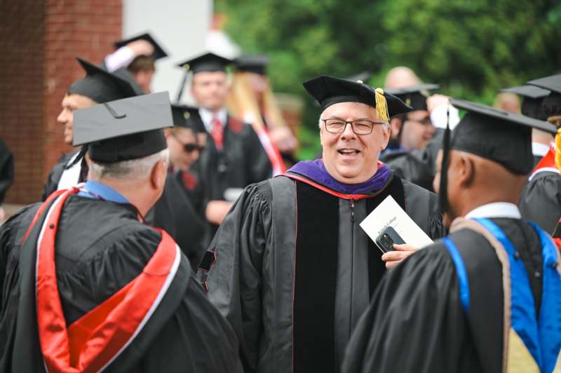 a man in a graduation gown