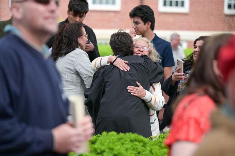 a group of people hugging