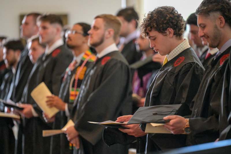a group of people in graduation gowns