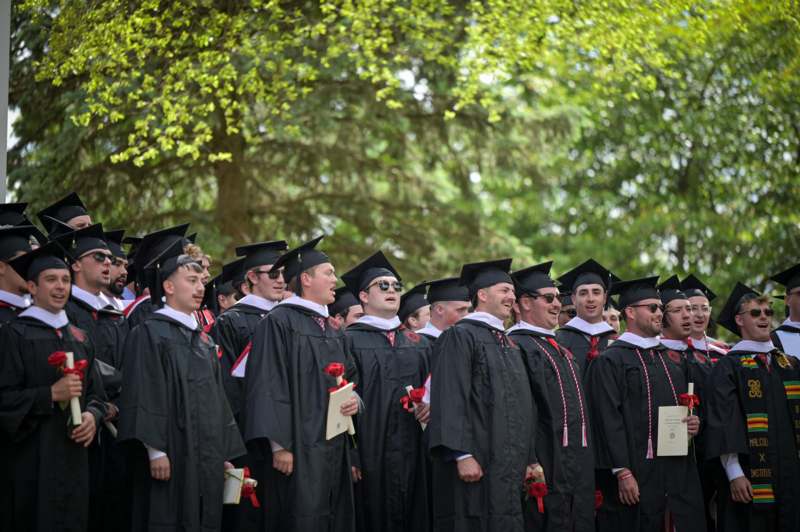 a group of people in graduation gowns