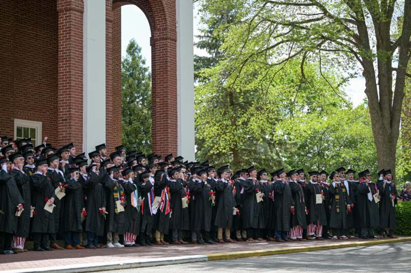 a group of people in graduation gowns