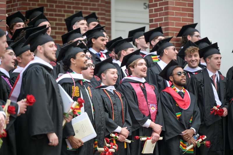 a group of people in graduation gowns