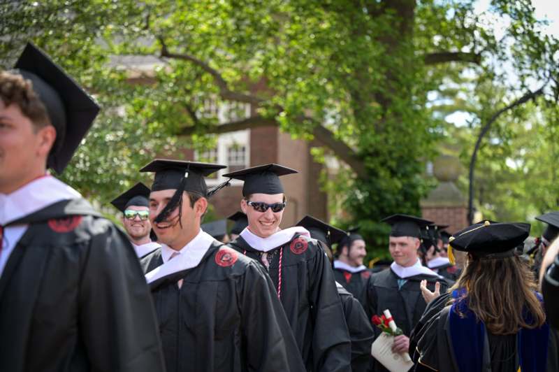 a group of people in graduation gowns