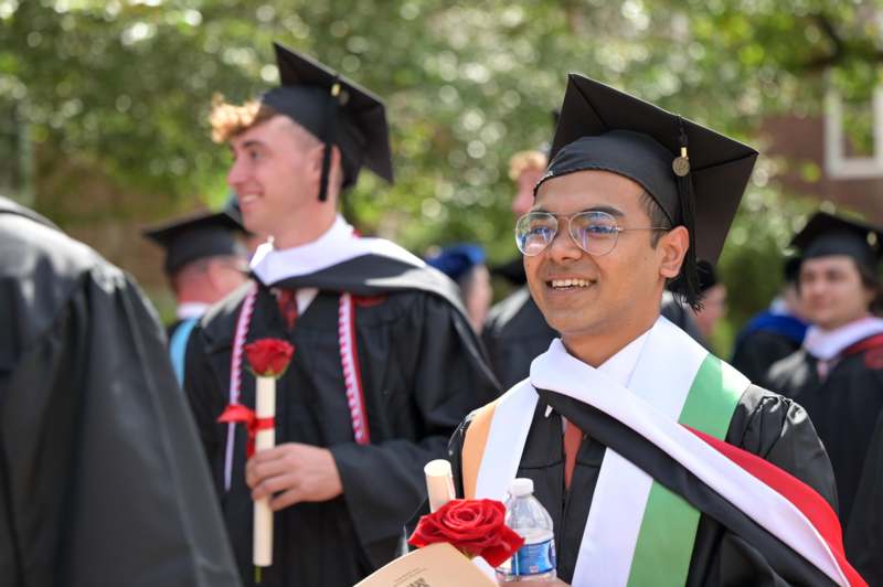 a man in a graduation gown