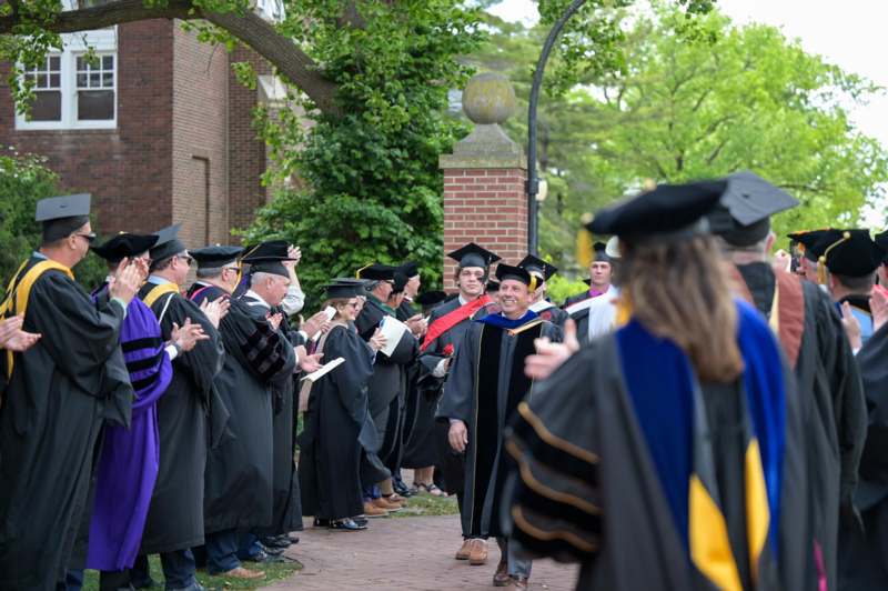 a group of people in graduation gowns