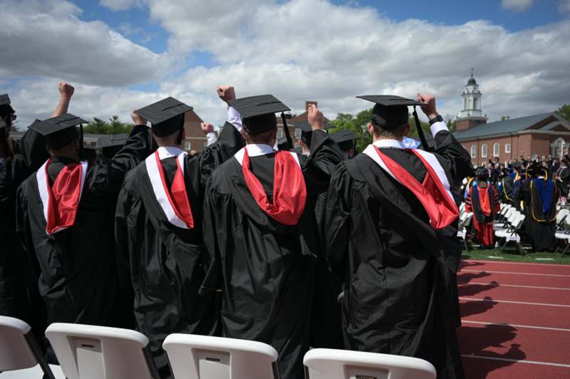 a group of people in graduation gowns