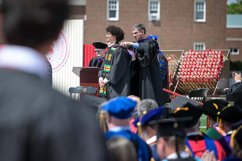a group of people in graduation gowns