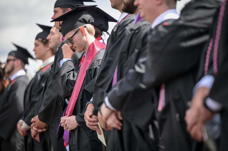 a group of people in graduation gowns