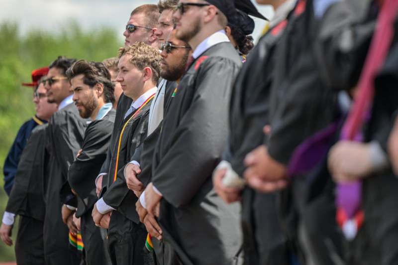 a group of people in graduation gowns