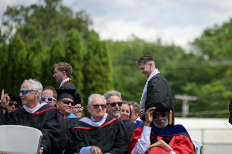 a group of people in graduation gowns