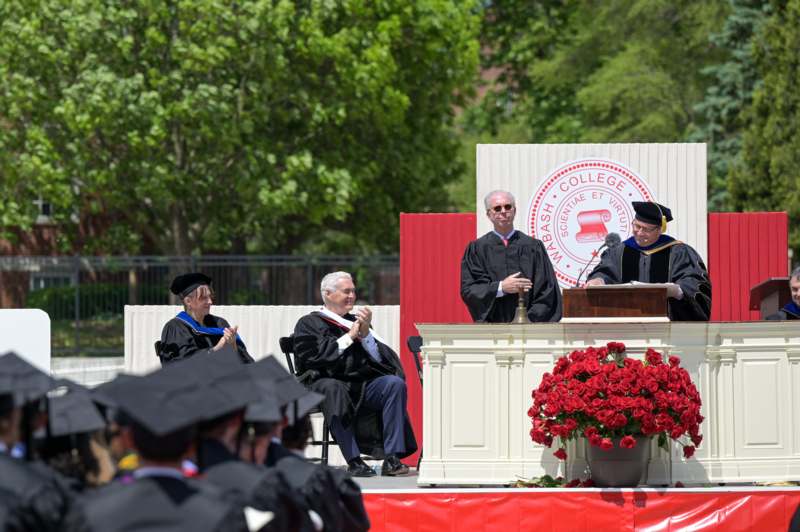 a group of people in black robes